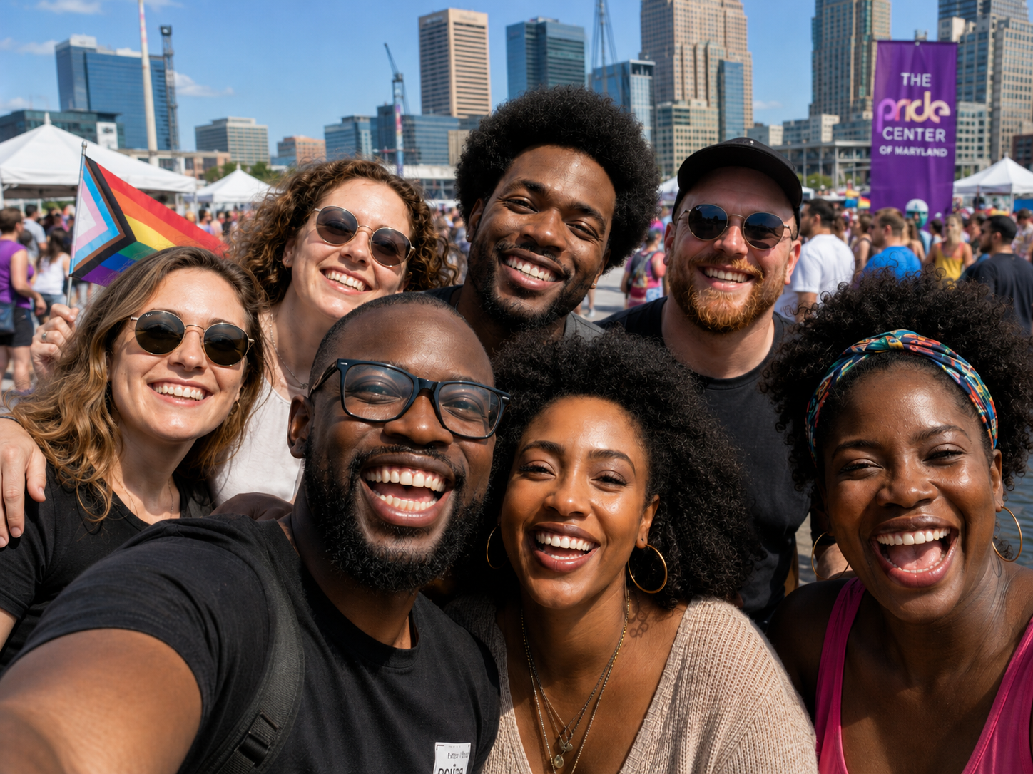 PCOMPlus members celebrating together at a Baltimore Pride event